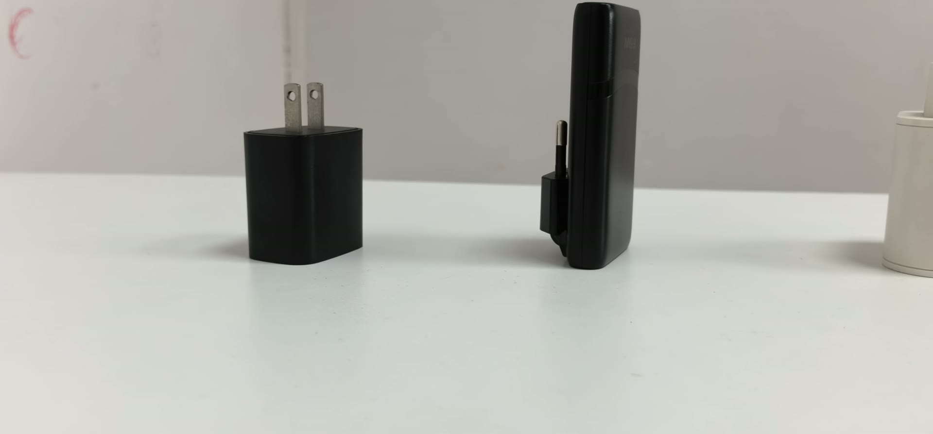 Desktop power adapters and product catalog on display